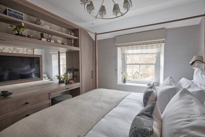 The bedroom with dressing table at Beatrix Cottage, Lake District