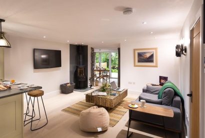 The living room with log burner at Shepherd's View, Lake District