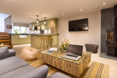 The living room with log burner at Shepherd's View, Lake District