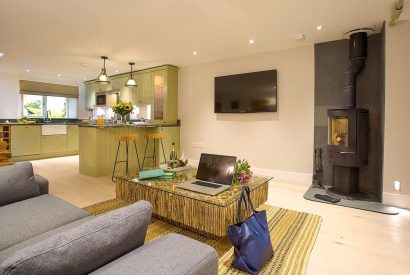 The living room with log burner at Shepherd's View, Lake District