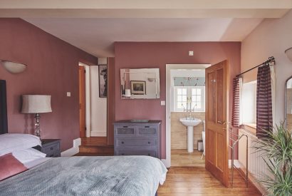 The bedroom with ensuite at The Luxury Barn, Peak District
