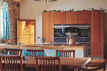 The kitchen and dining area at Woodpecker Loft, Peak District