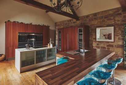 The kitchen and dining area at Woodpecker Loft, Peak District