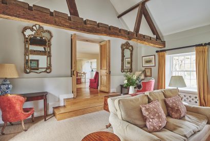 Steps into the living room at Tennyson House, Cotswolds