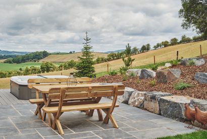 Outdoor seating area at Upper Tumble Cottage, Shropshire Hills