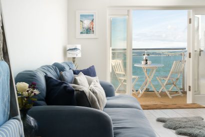 The hand-crafted sofa in the living room at Waters Dream, Devon