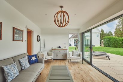 The living room with patio doors at Oakfield, Somerset
