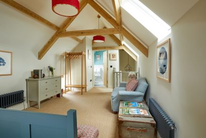 The master bedroom with ensuite at Haymaker Barn, Cotswolds