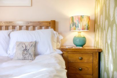 A double bed at Grindle Cottage, Devon