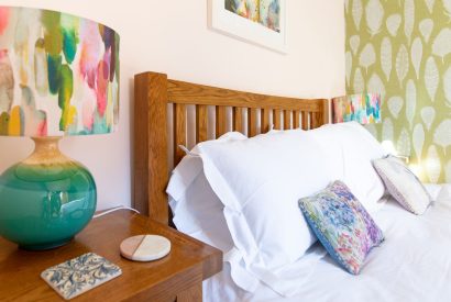 A double bed at Grindle Cottage, Devon