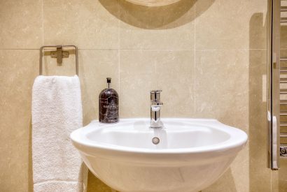 A bathroom sink at Grindle Cottage, Devon