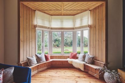 The living room window seat at The Old Vicarage, Lake District