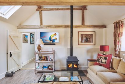 The living room with log burner at Jersey Barn, Chiltern Hills