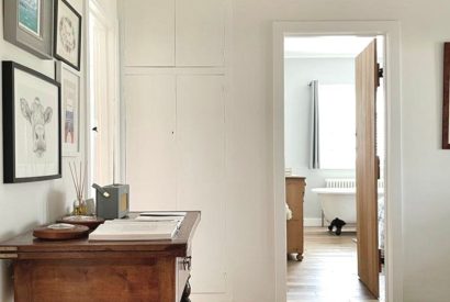 The hallway leading to a bedroom at Brickworks and Vines, Isle of Wight