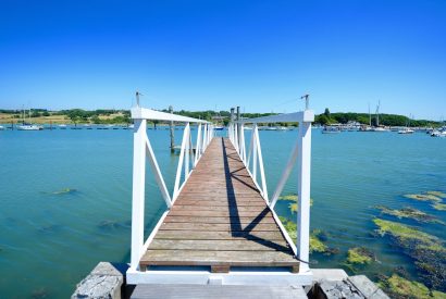 A jetty over the sea at Brickworks and Vines, Isle of Wight