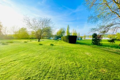 The lawned garden at Brickworks and Vines, Isle of Wight