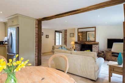 The dining room leading towards the living room at Brightwaters Stables, Hampshire