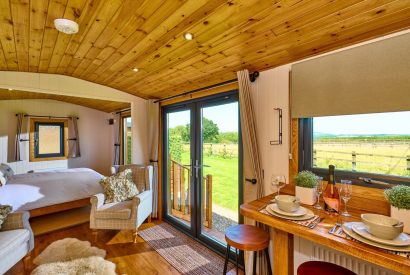 The breakfast bar and living space at Abberley Shepherd's Hut, Worcestershire