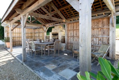 The outdoor dining area at Little Haven, Gower