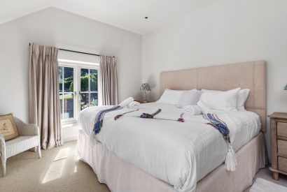 A super king sized bedrom at Little Haven, Gower