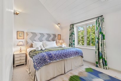 A super king sized bedrom at Little Haven, Gower