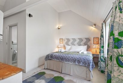 A super king sized bedrom at Little Haven, Gower