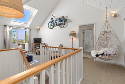 A seating area at Little Haven, Gower