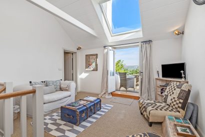 A seating area at Little Haven, Gower