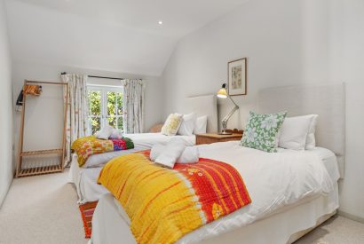A twin bedroom at Little Haven, Gower