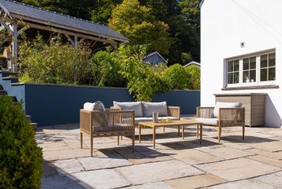 Outdoor seating area at Little Haven, Gower