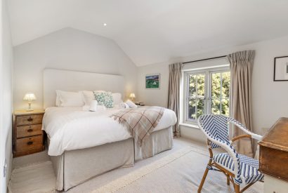 A super king sized bedroom at Little Haven, Gower