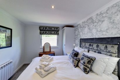 The king size bedroom at The Hunter's Lodge, Loch Lomond