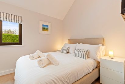 A double bedroom at The Old School, Oxwich