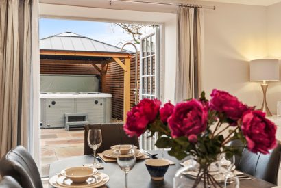 View to the hot tub at The Old School, Oxwich