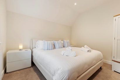 A king size bedroom at The Old School, Oxwich