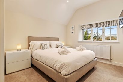 A king size bedroom at The Old School, Oxwich