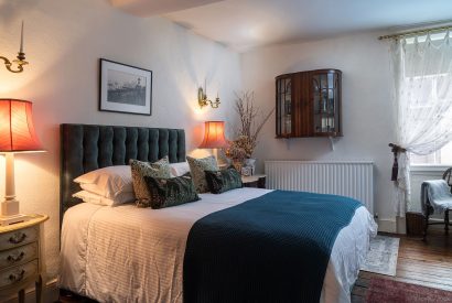 A king size bedroom at 40 Mill Street, Ludlow
