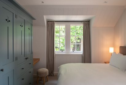 A super king size bedroom at Muirfield Green, East Lothian