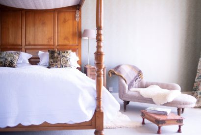 A four poster bedroom at Chulmleigh Manor, Devon