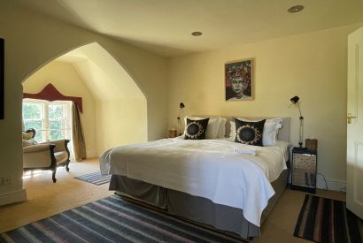 A king size bedroom at Chulmleigh Manor, Devon