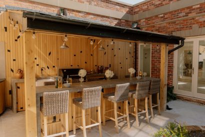 The outdoor bar and kitchen area at Cheshire Manor, Bickerton