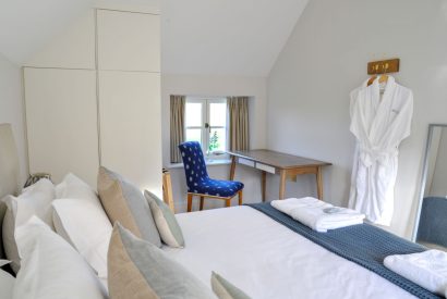 A super king sized bedroom at The Creamery, Somerset