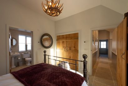 A king sized bedroom at Torran Steading, Perthshire