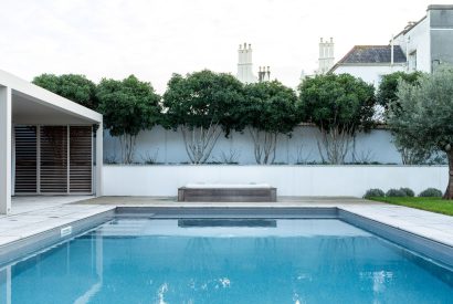 The heated outdoor swimming pool at White Exeter House, Devon
