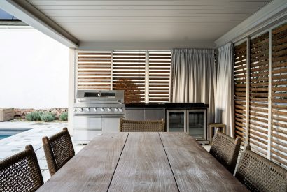 The outdoor kitchen and dining area at White Exeter House, Devon