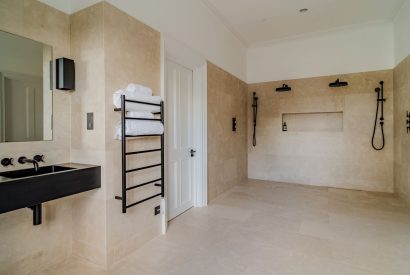 A shower room at White Exeter House, Devon