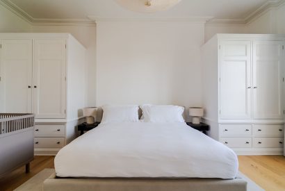 A super king size bedroom at White Exeter House, Devon