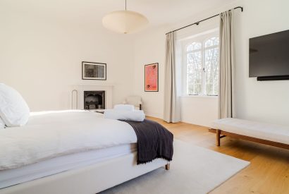 A super king size bedroom at White Exeter House, Devon