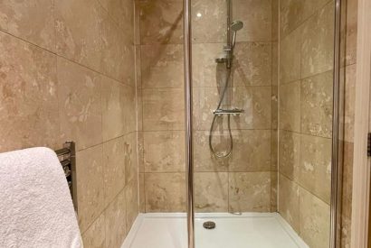 A shower room at Acacia Cottage, Hampshire