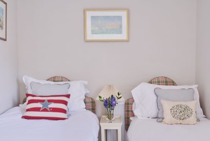 A twin bedroom at Hockham House, Norfolk Coast